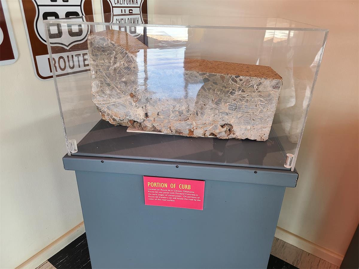 Located on Route 66 in Clinton, OK. Route 66 was paved with Portland Concrete in the early stages of construction. On portions of Route 66, travelers can still locate the road by the color of the road surface.